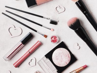 lay-out-of-make-up-cosmetics-decorated-with-hearts